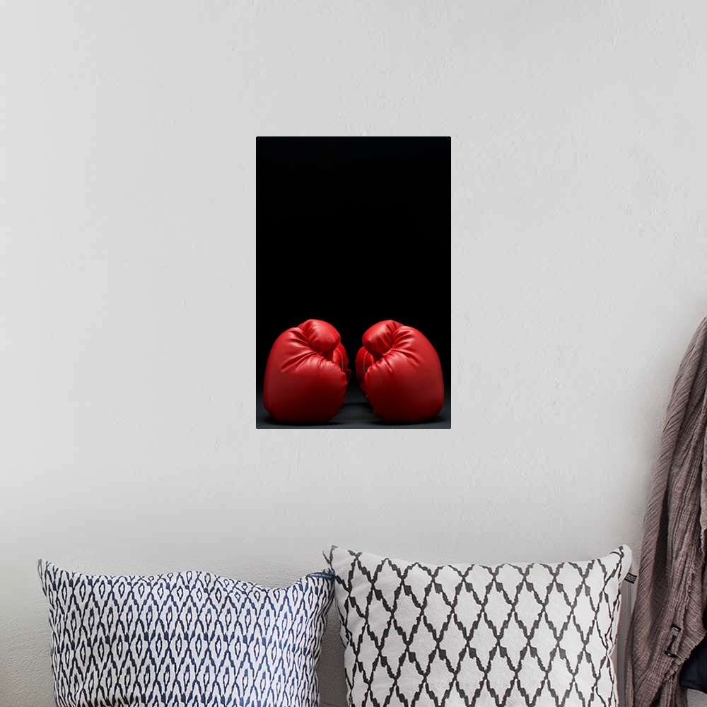 A bohemian room featuring Pair Of Red Boxing Gloves