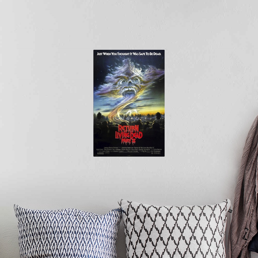 A bohemian room featuring RETURN OF THE LIVING DEAD PART II, US poster, 1988
