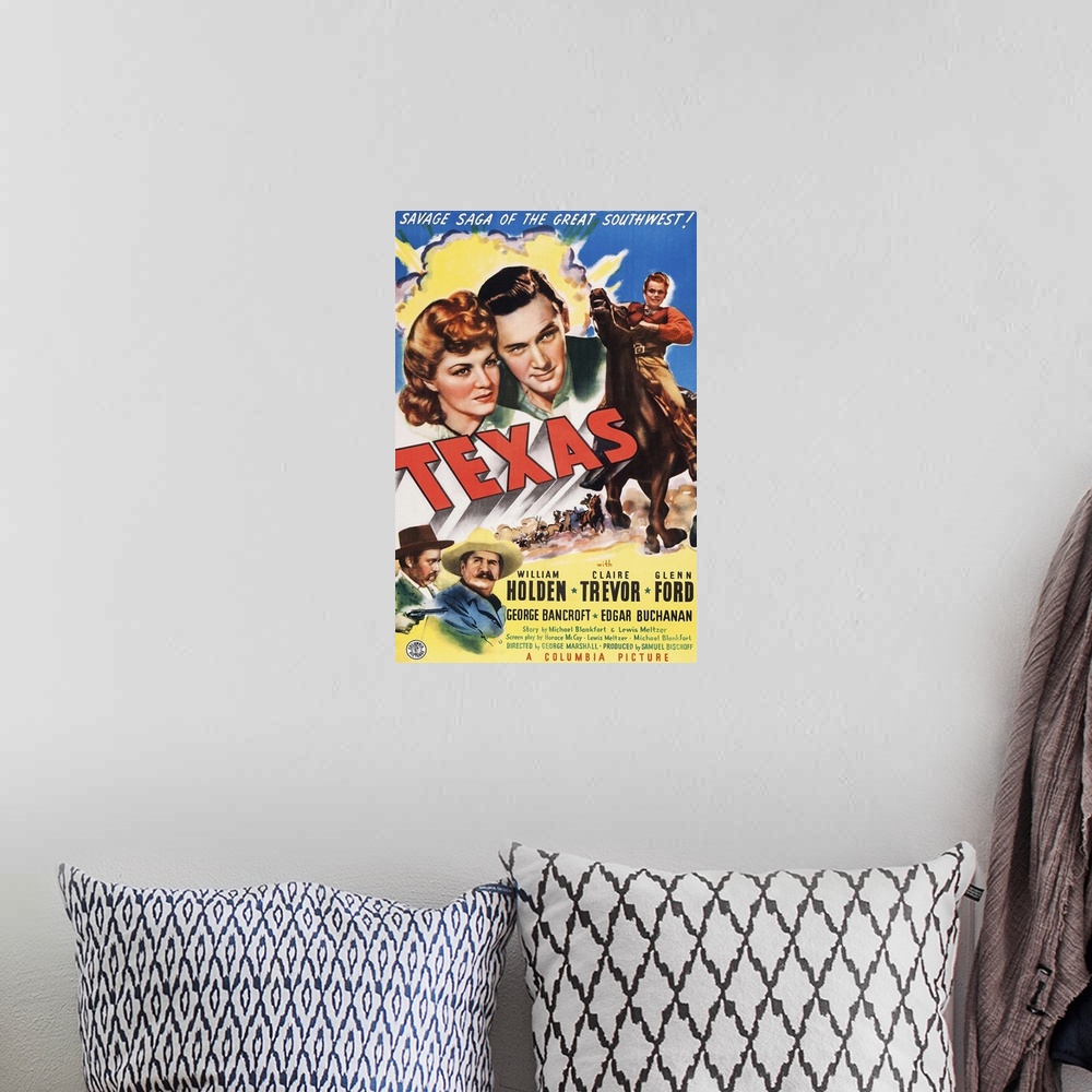 A bohemian room featuring Retro poster artwork for the film Texas.