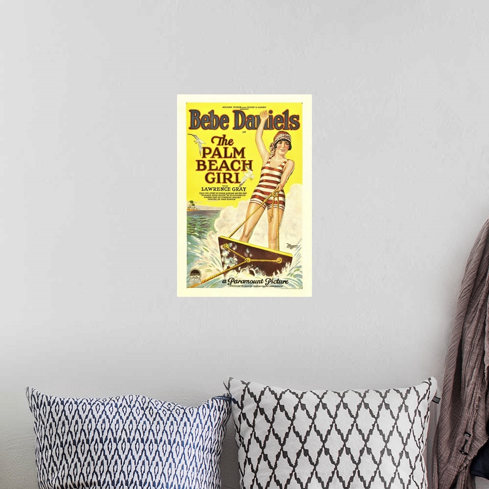 A bohemian room featuring The Palm Beach Girl - Vintage Movie Poster