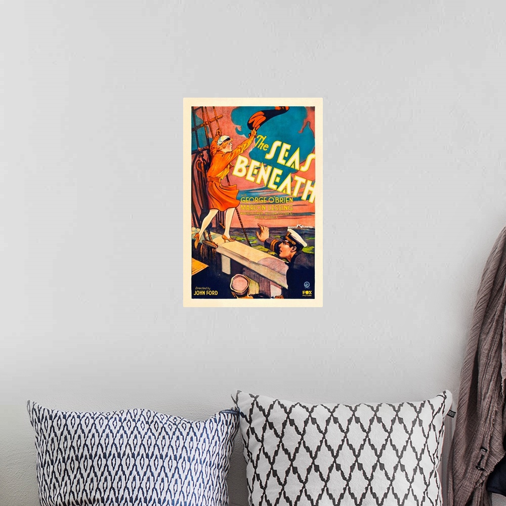 A bohemian room featuring The Seas Beneath - Vintage Movie Poster