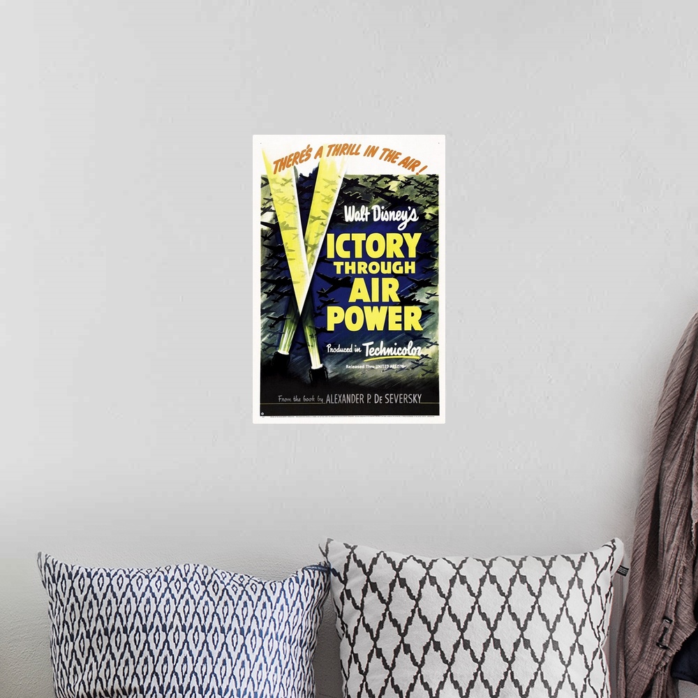 A bohemian room featuring Victory Through Air Power - Vintage Movie Poster