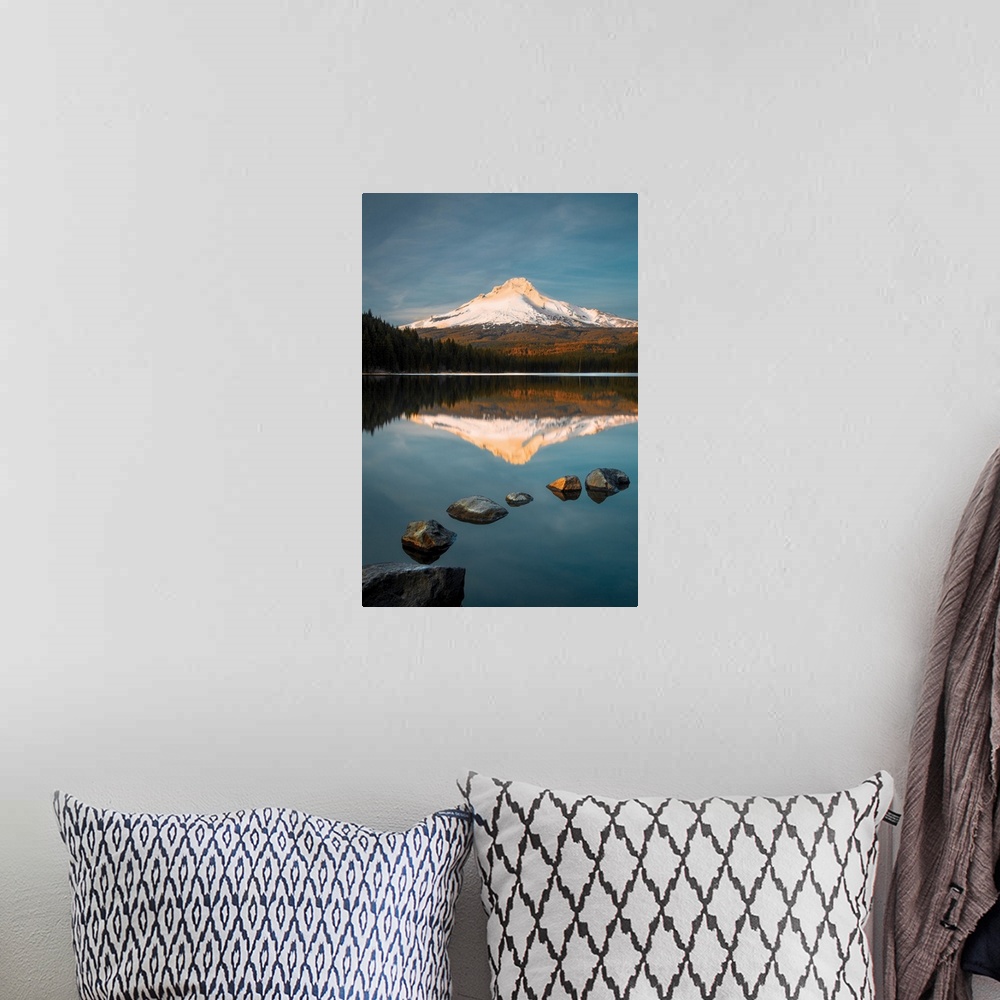 A bohemian room featuring Snow-capped Mount Hood reflected in the lake below at sunset, Oregon.