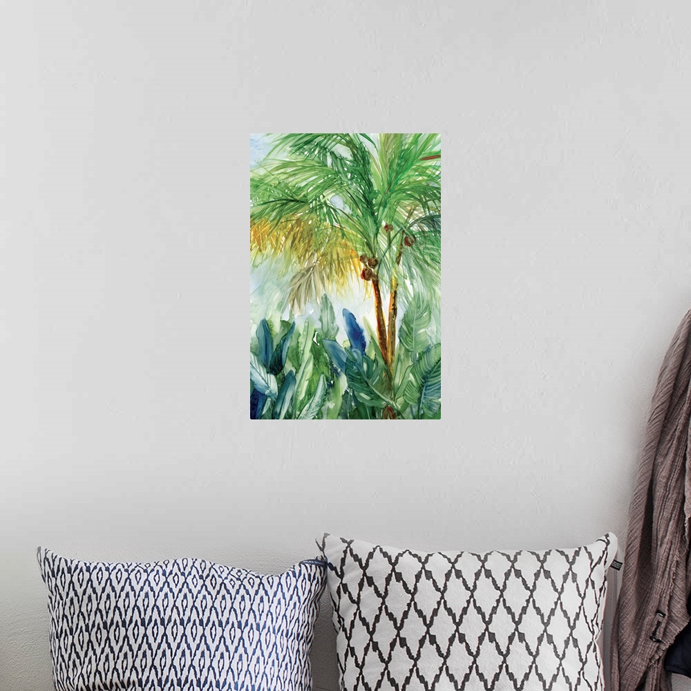 A bohemian room featuring Vertical watercolor painting of a coconut tree surrounded by palm leaves.