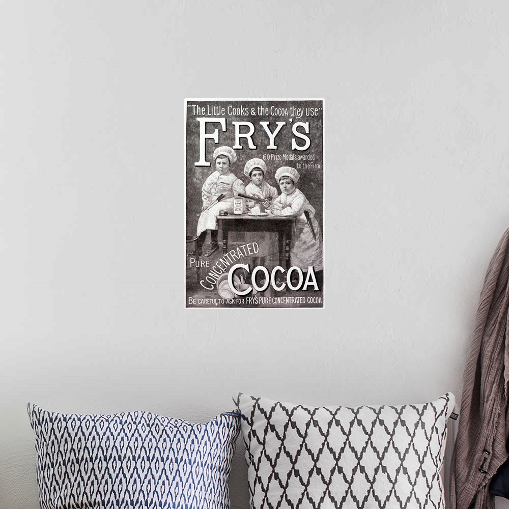 A bohemian room featuring Advertisement for Fry's Cocoa. Shows children in chef's clothing round a kitchen table.