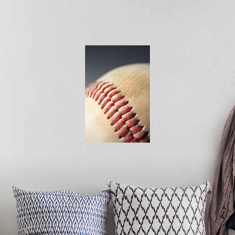A bohemian room featuring Baseball with impact mark.