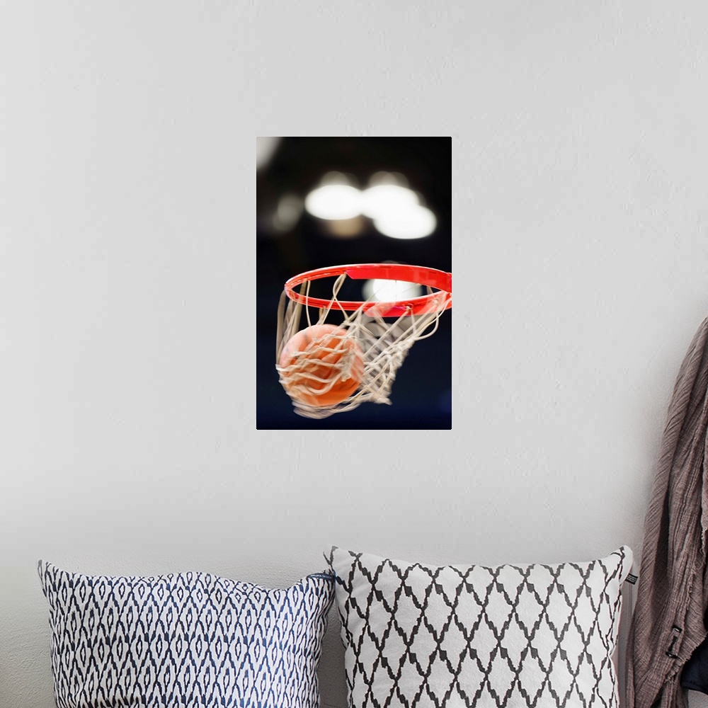 A bohemian room featuring Basketball in basket.