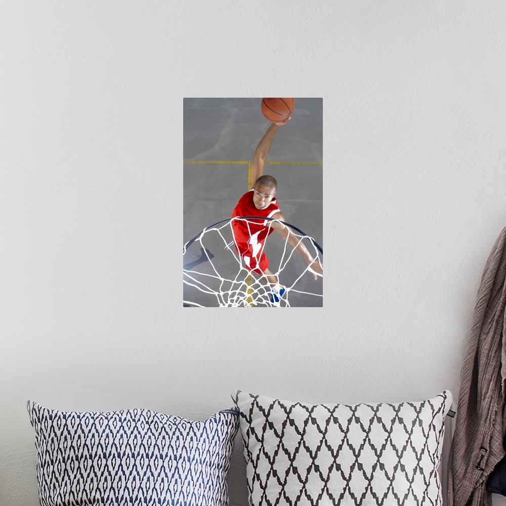 A bohemian room featuring Basketball player about to dunk