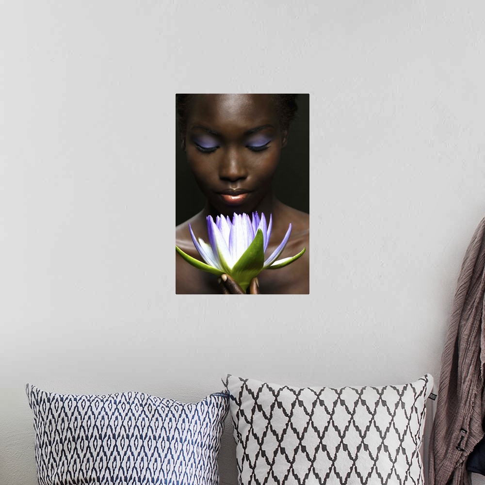A bohemian room featuring Afro-American woman with purple lotus flower