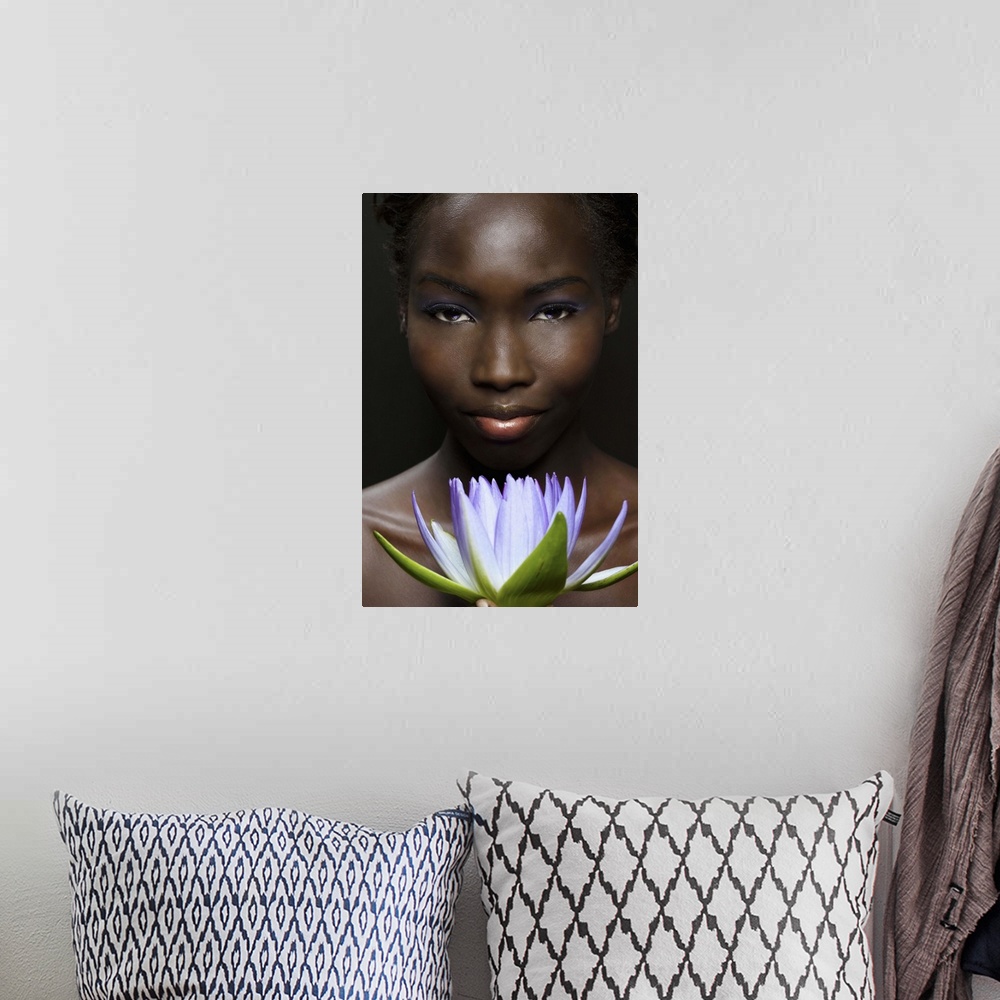 A bohemian room featuring Afro-American woman with purple lotus flower