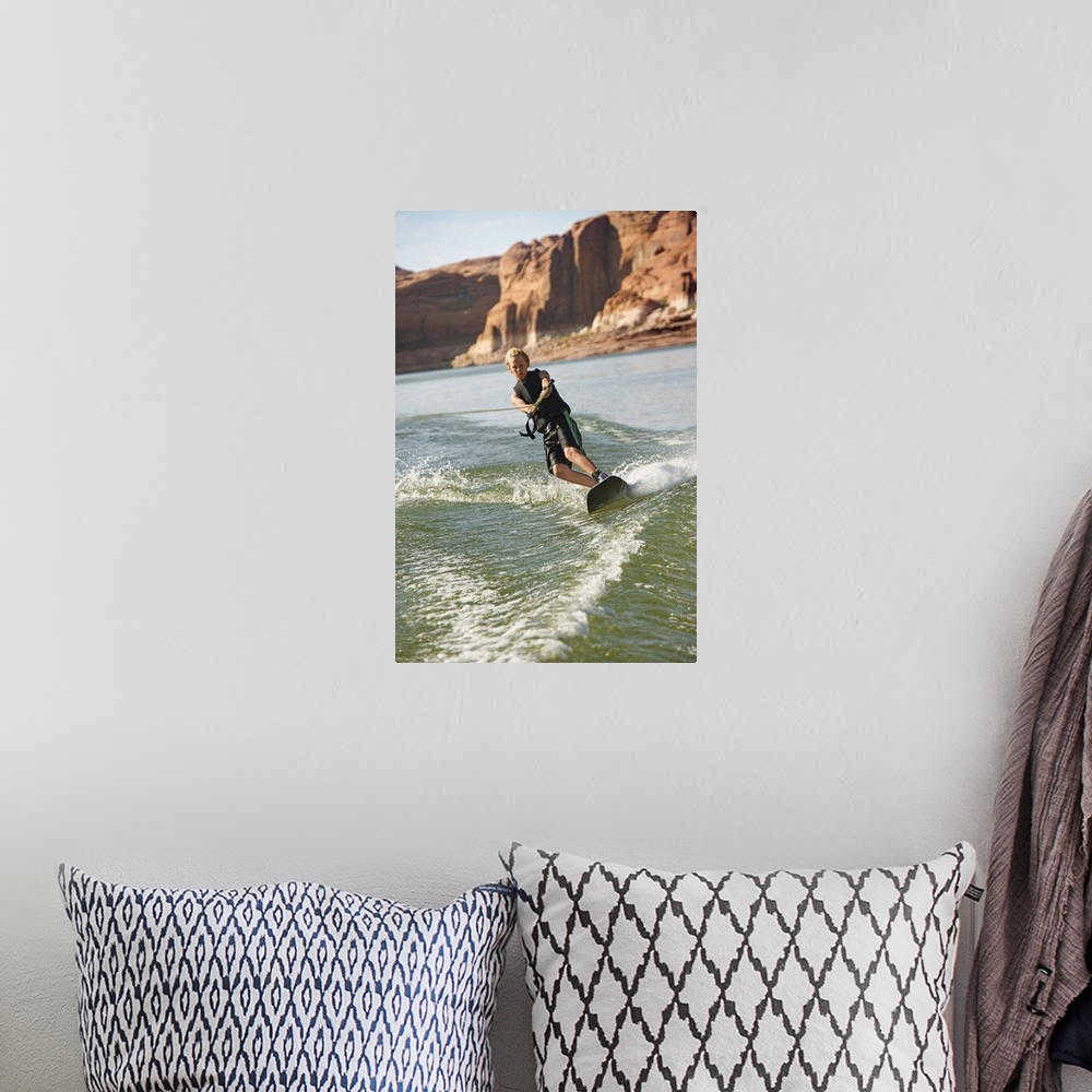 A bohemian room featuring Boy wakeboarding on Lake Powell
