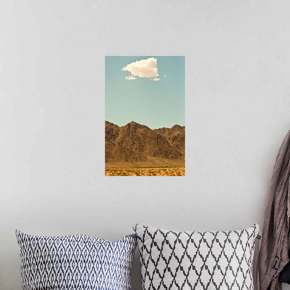 A bohemian room featuring Cloud over Nevada desert and mountains