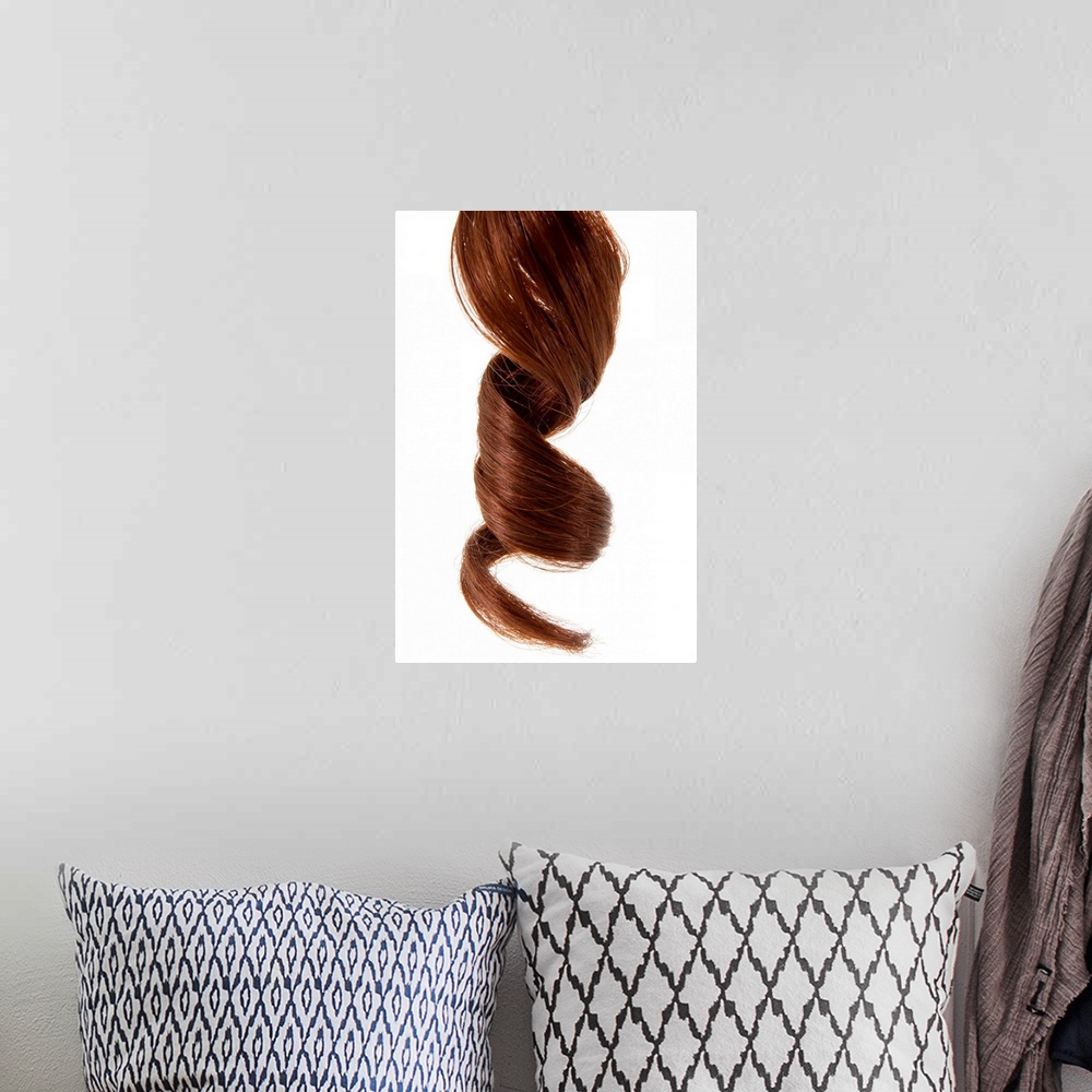 A bohemian room featuring Up-close photograph of spiraled pony tail end.