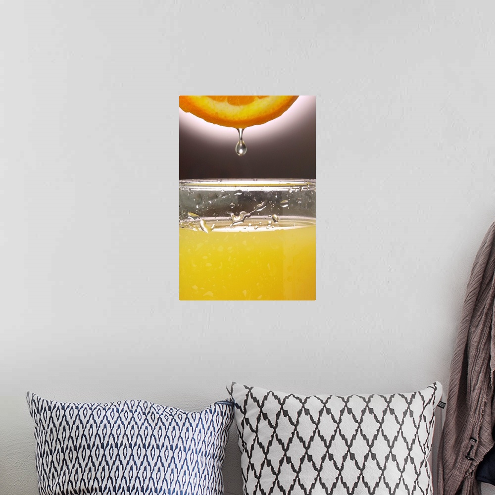 A bohemian room featuring Droplet of orange going into juice