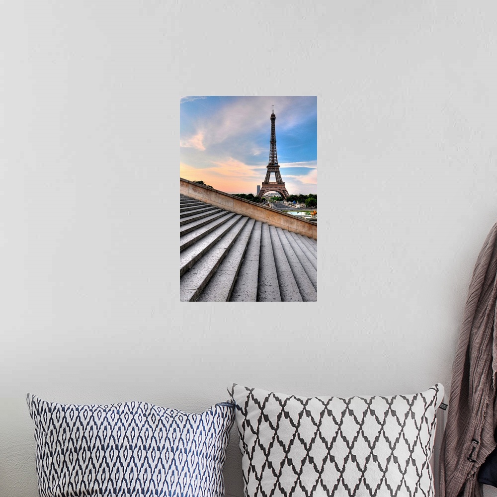 A bohemian room featuring Eiffel tower at sunrise, Paris, France.