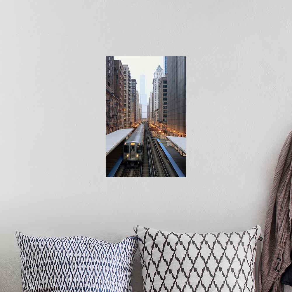 A bohemian room featuring Vertical panoramic photograph of railway lined with tall buildings and skyscrapers.