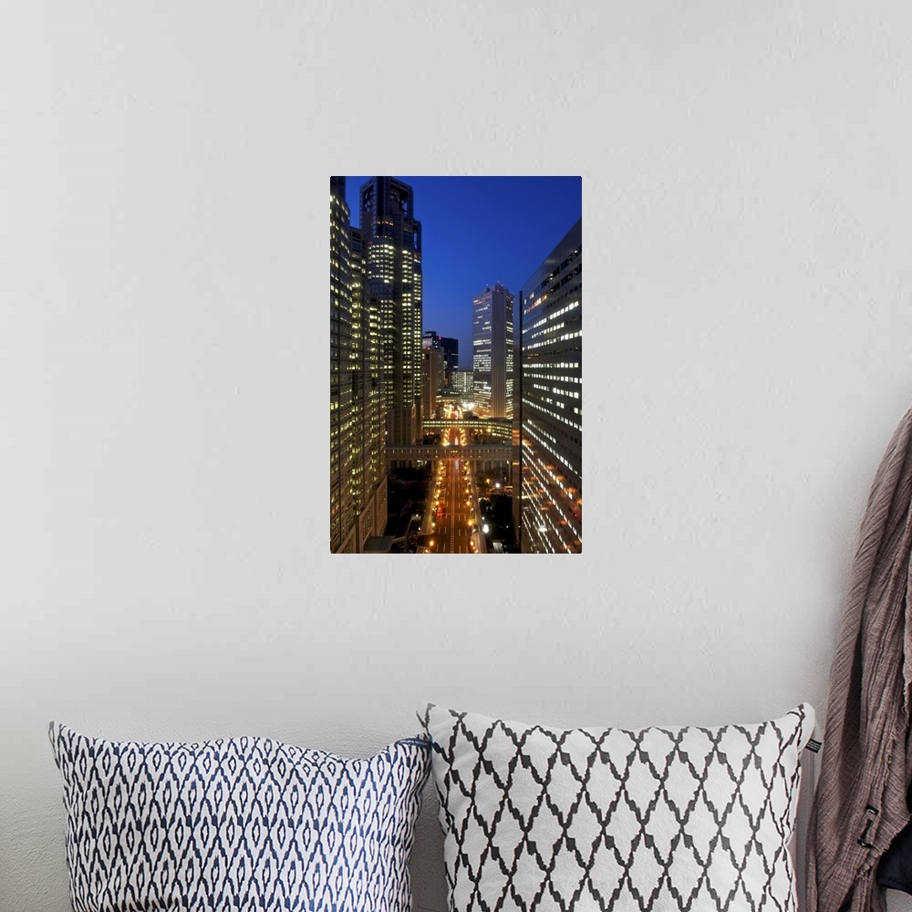 A bohemian room featuring Eye level view of skyscrapers in commercial district of Tokyo- Shinjuku at dusk.
