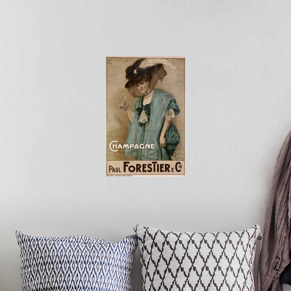 A bohemian room featuring French poster advertising champagne