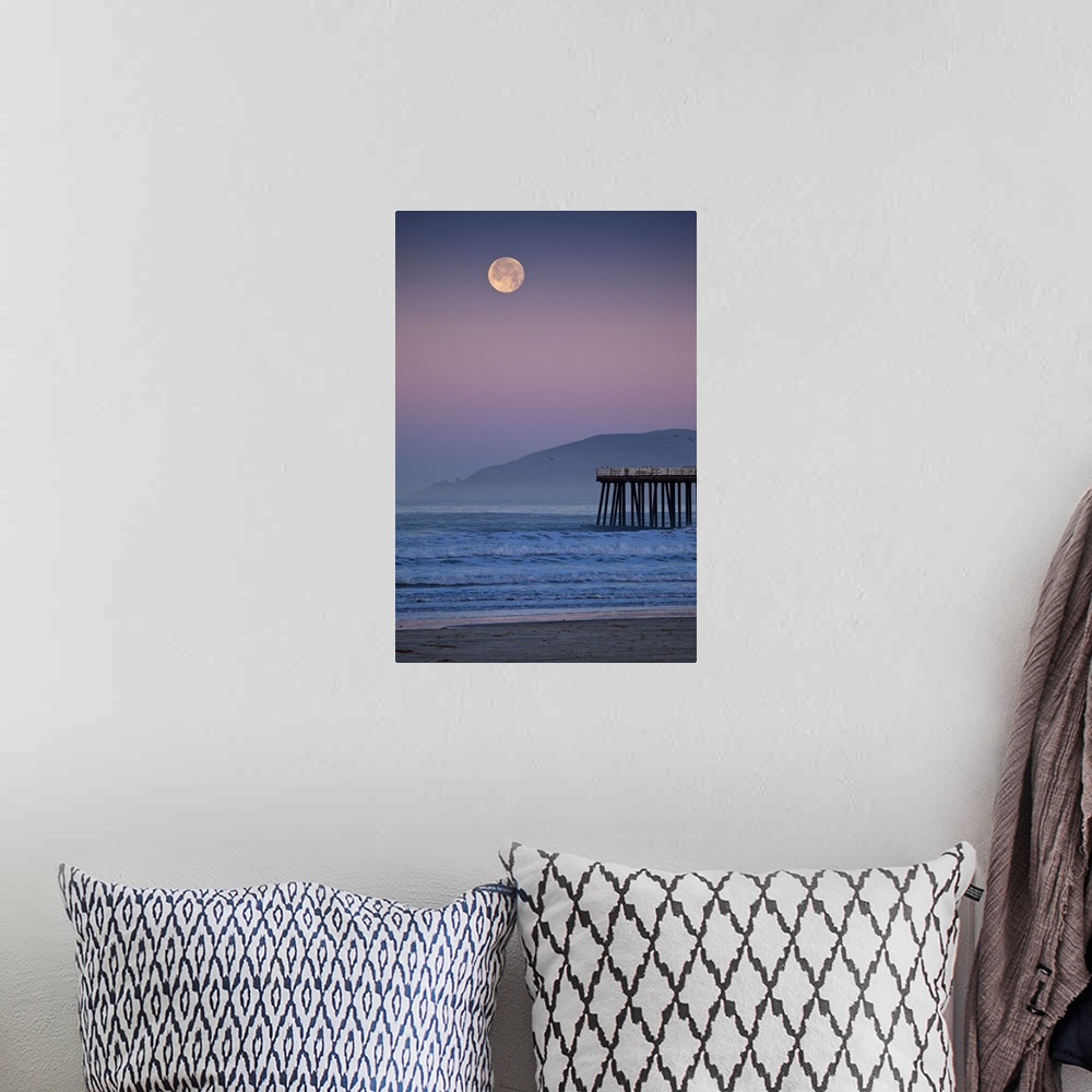A bohemian room featuring Full moon sets over  Pismo Beach at sunrise on winter morning.