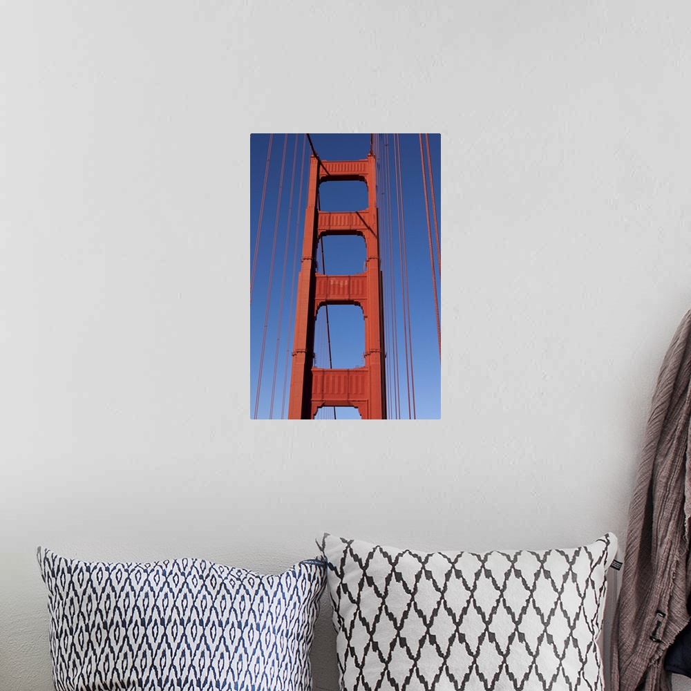 A bohemian room featuring Golden Gate Bridge Tower against blue sky