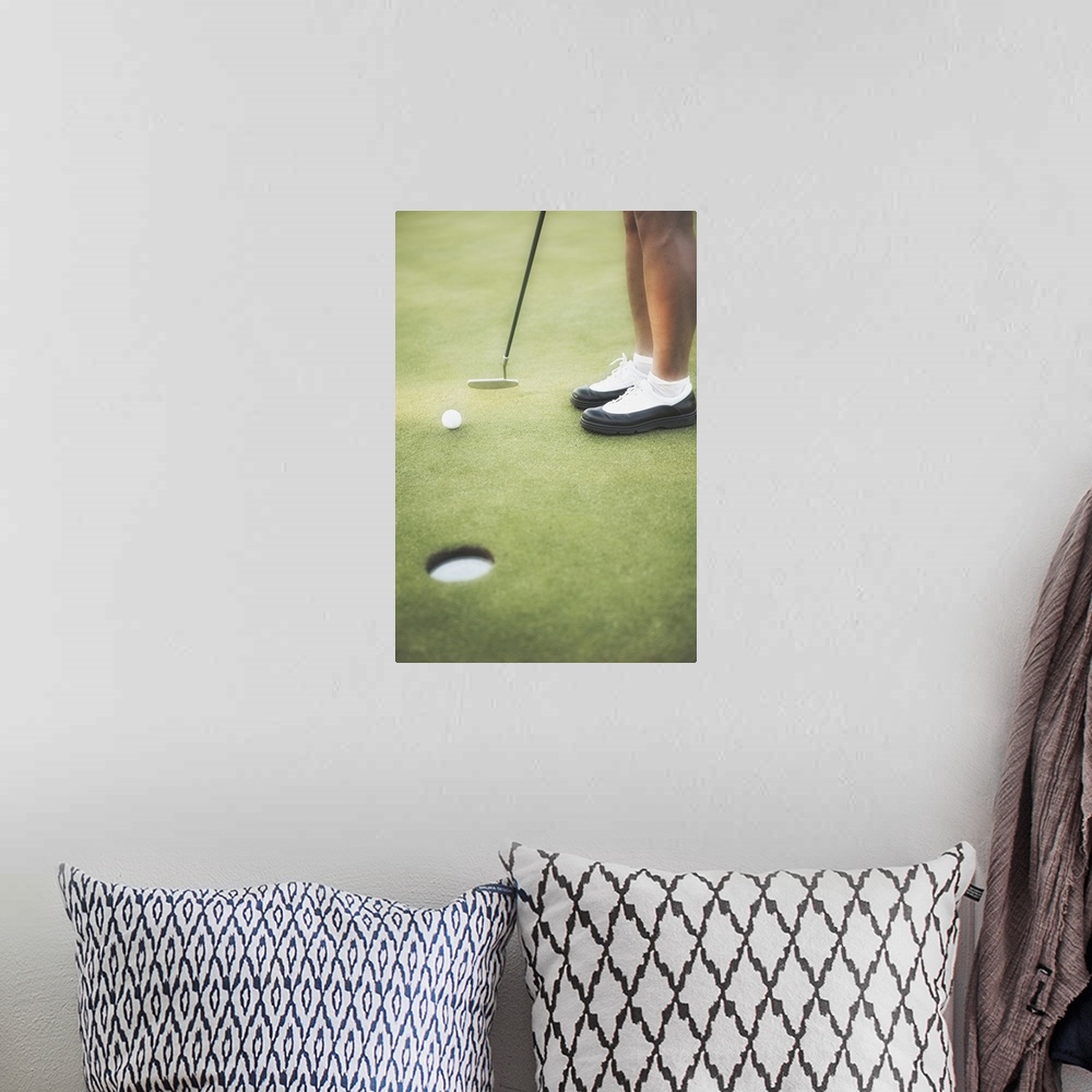 A bohemian room featuring Golfer putting