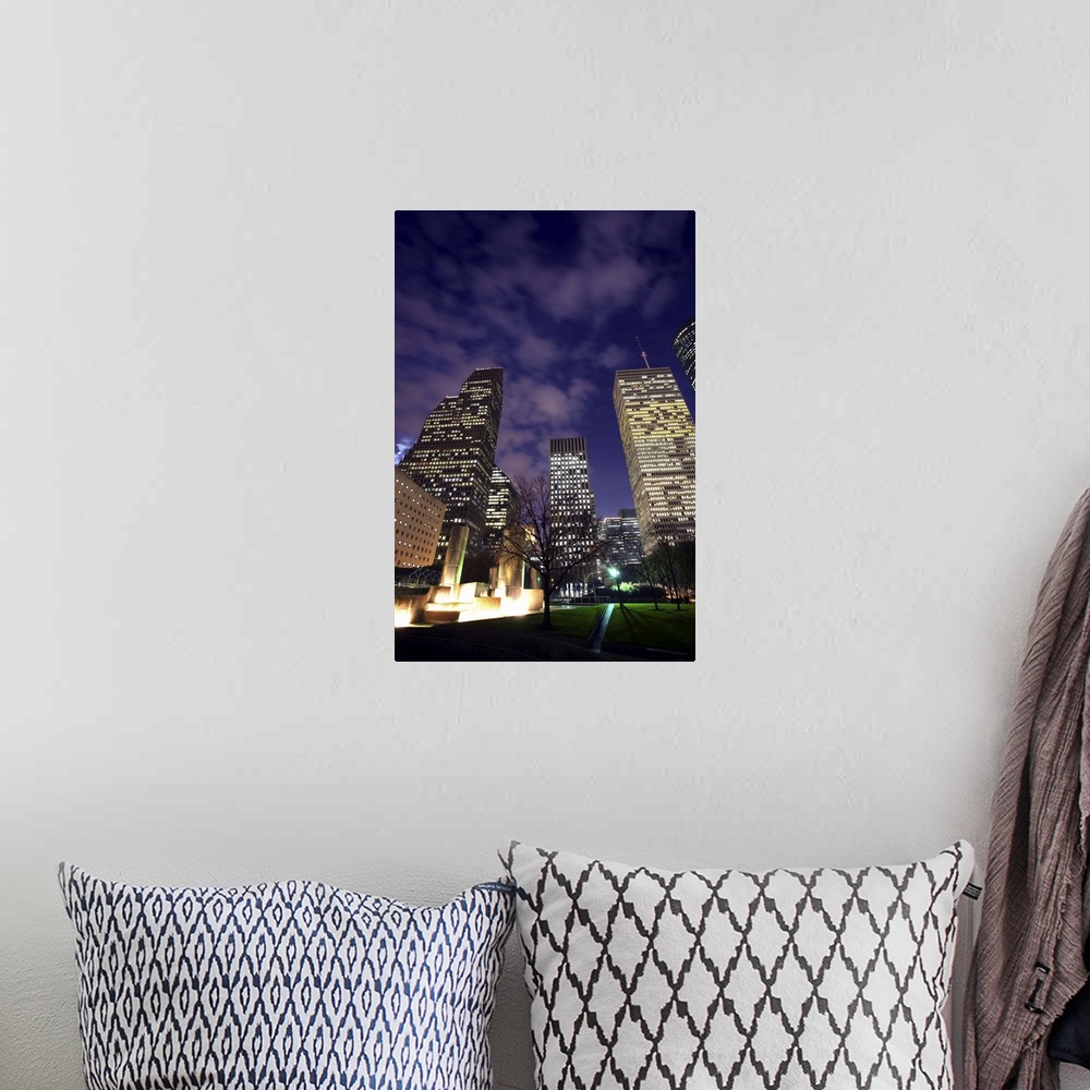 A bohemian room featuring Houston skyline at night