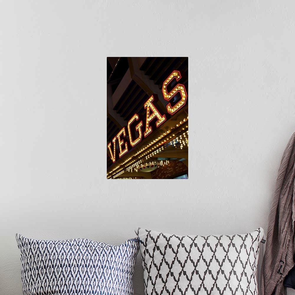 A bohemian room featuring Illuminated Vegas sign