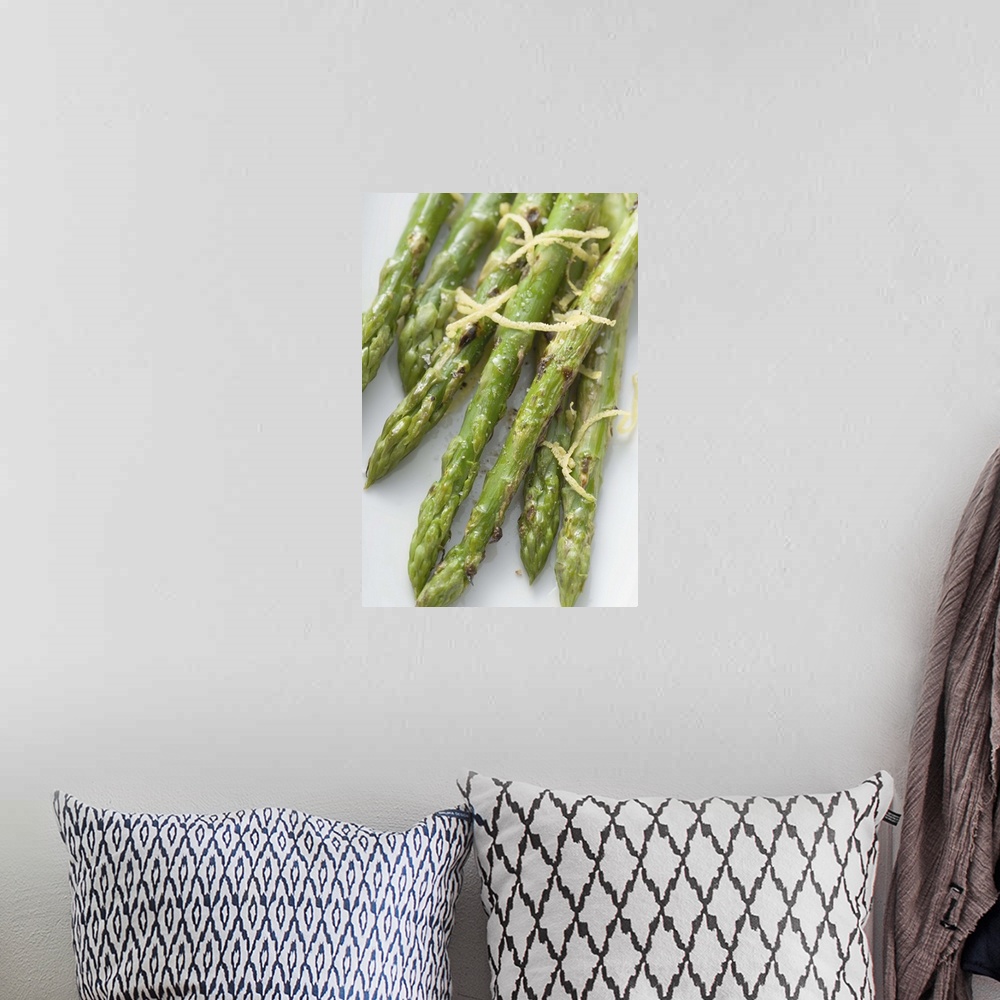 A bohemian room featuring Roasted green asparagus with lemon zest, overhead view