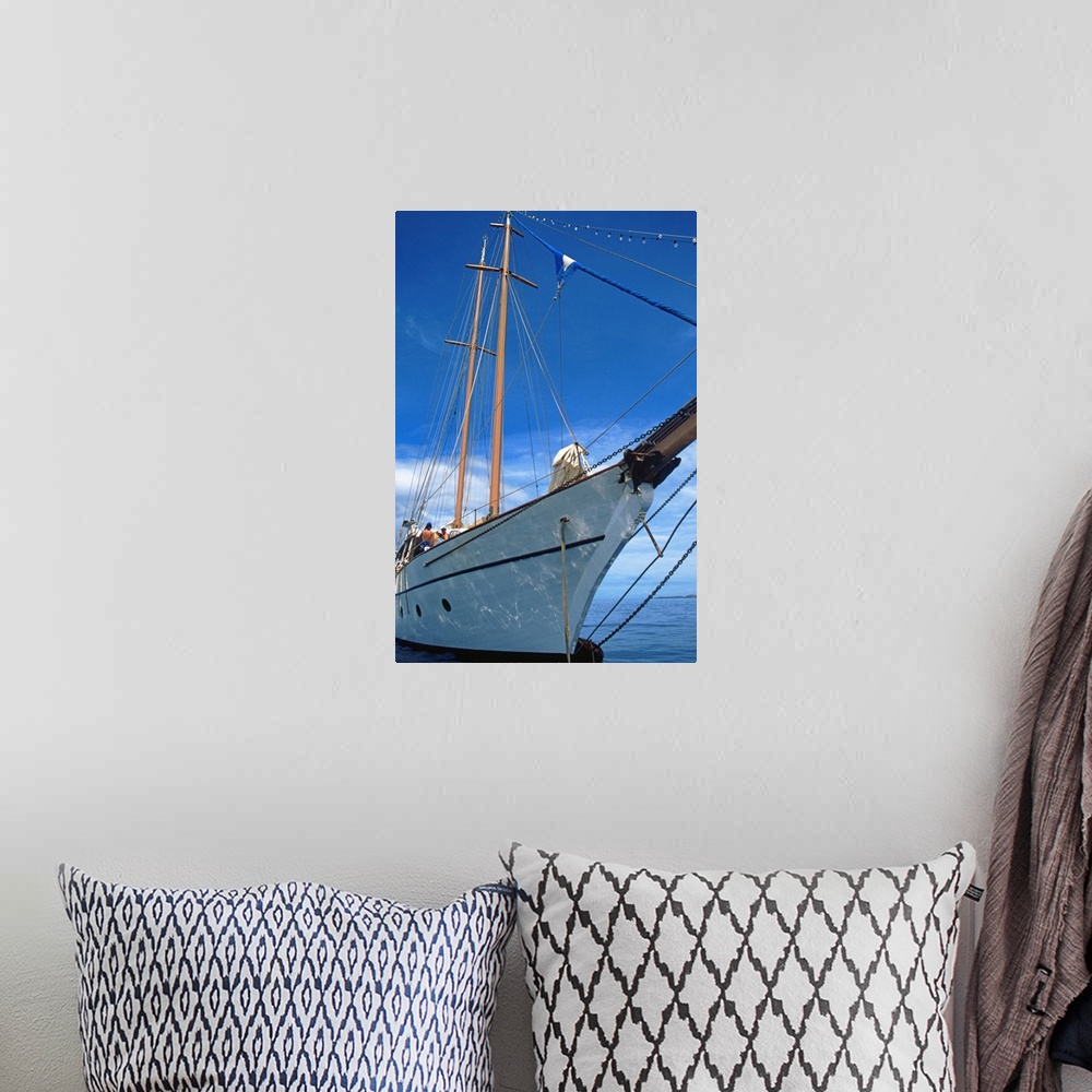 A bohemian room featuring sailing boat