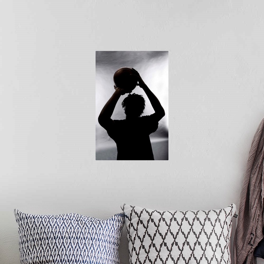 A bohemian room featuring Silhouette of basketball player