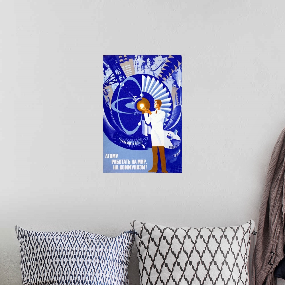 A bohemian room featuring Soviet propaganda poster celebrating putting the atom to work for peace and Communism. Poster sho...