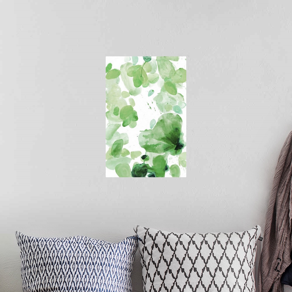 A bohemian room featuring Watercolor painting of in shades of green on white.