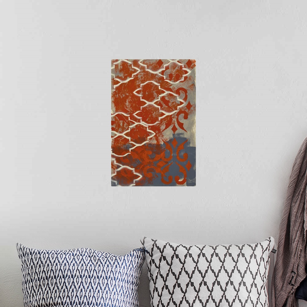 A bohemian room featuring Contemporary abstract painting created with grey and red hues and repeating shapes.