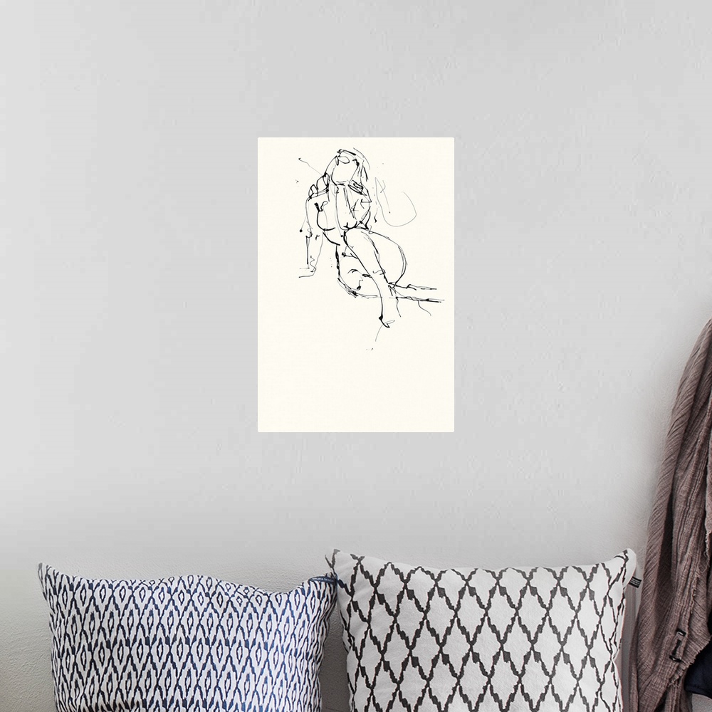 A bohemian room featuring Contemporary nude sketch of a woman using black ink on an off white background.