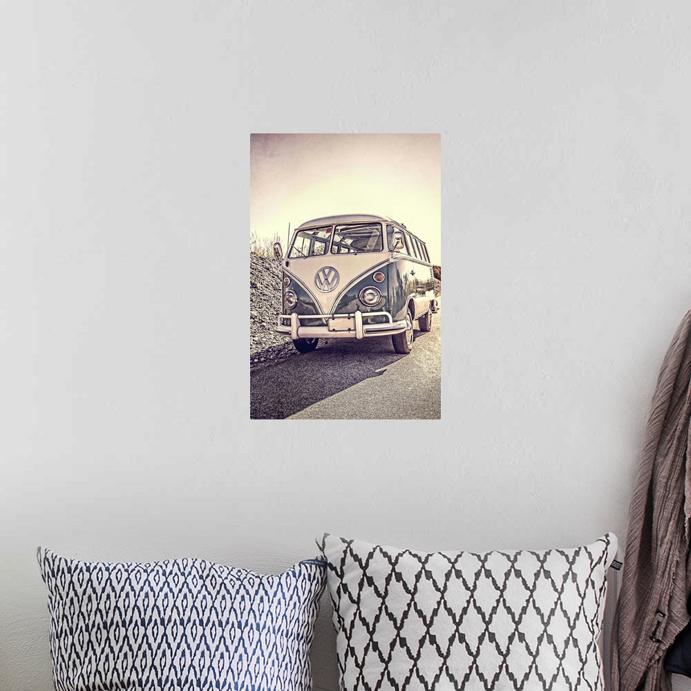 A bohemian room featuring A classic old surfers vintage Volkswagen 21 window Samba Bus at the beach.