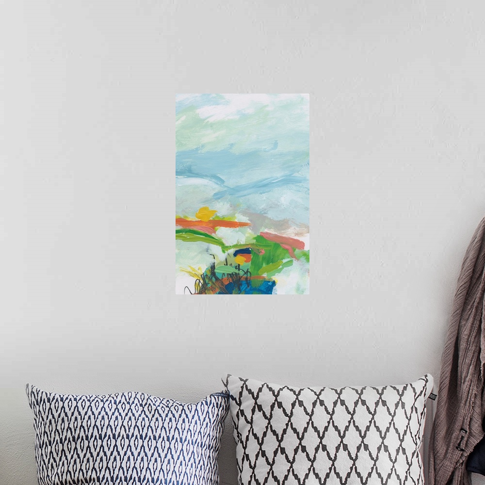 A bohemian room featuring Abstract landscape painting in green, orange, and pale blue.