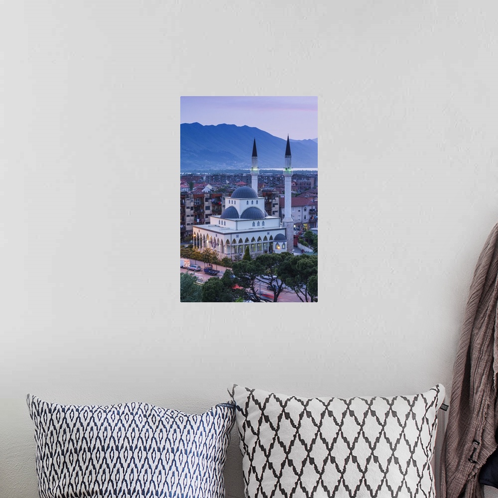 A bohemian room featuring Albania, Shkodra, elevated view of Zogu 1 Boulevard and mosque, dusk
