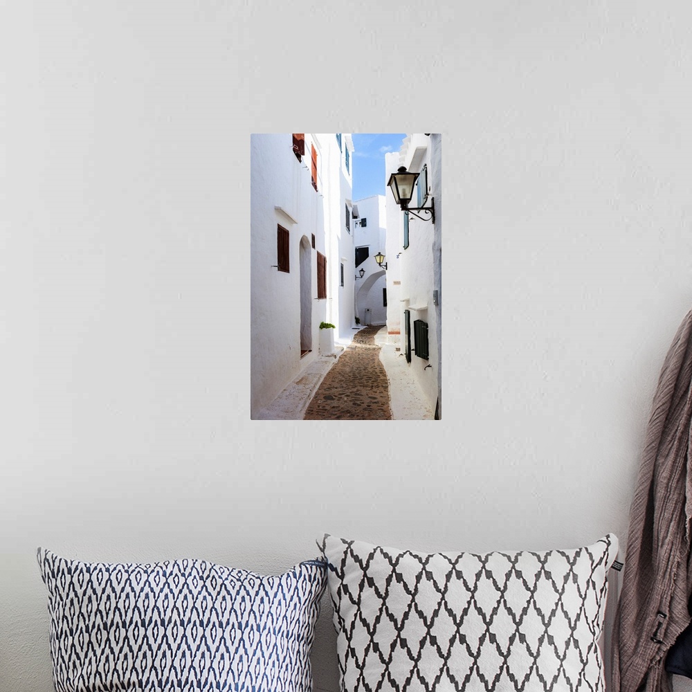 A bohemian room featuring Alley in the old town of Binibequer Vell, Menorca, Balearic Islands, Spain.