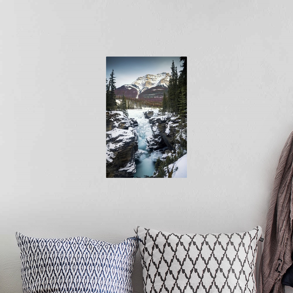 A bohemian room featuring Athabasca Falls in Winter,  Alberta, Canada.
