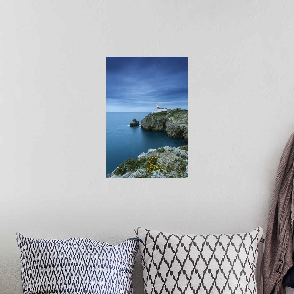 A bohemian room featuring Cabo de Sao Vicente (Cape St. Vincent) and the lighthouse at dusk. The southwesternmost lighthous...