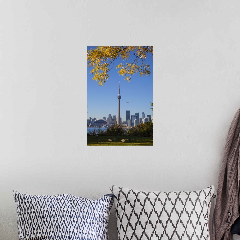 A bohemian room featuring Canada, Ontario, Toronto, View of CN Tower and city skyline from Center Island