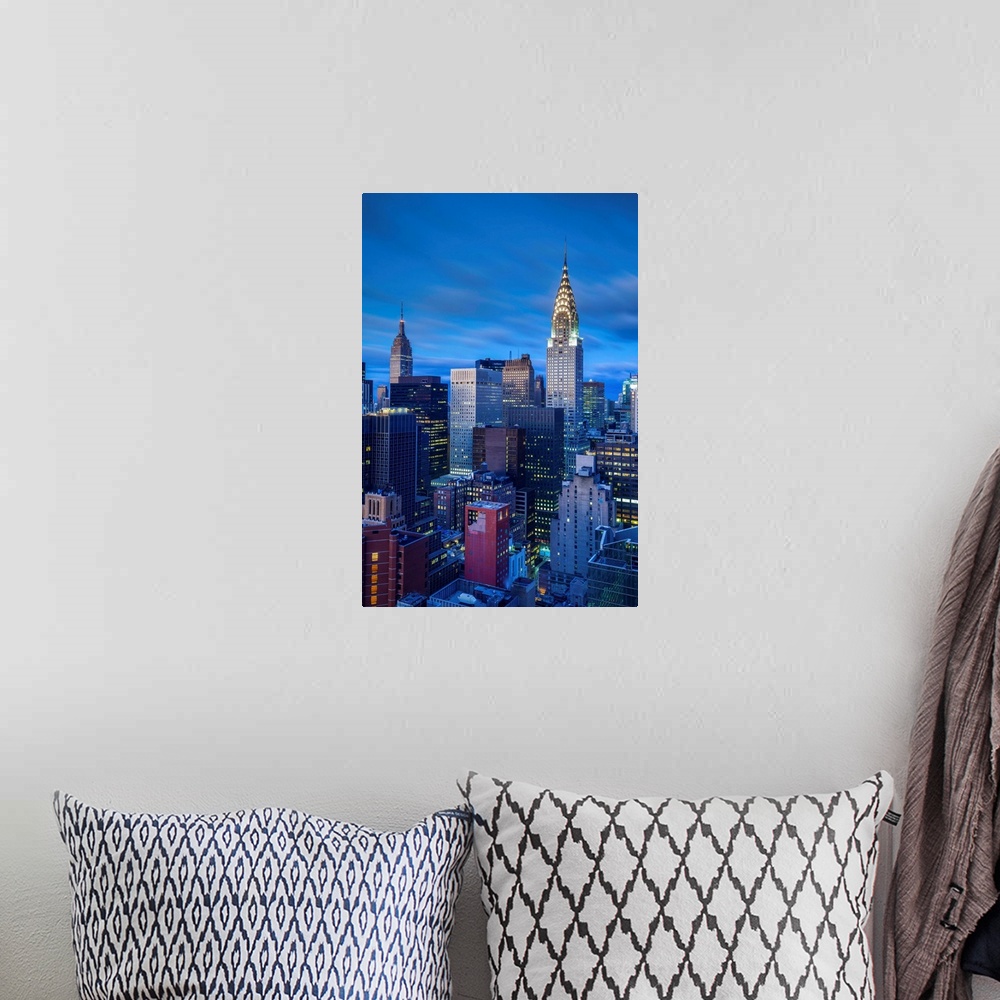A bohemian room featuring Chrysler Building and Empire State Building, Midtown Manhattan, New York City, New York, USA.