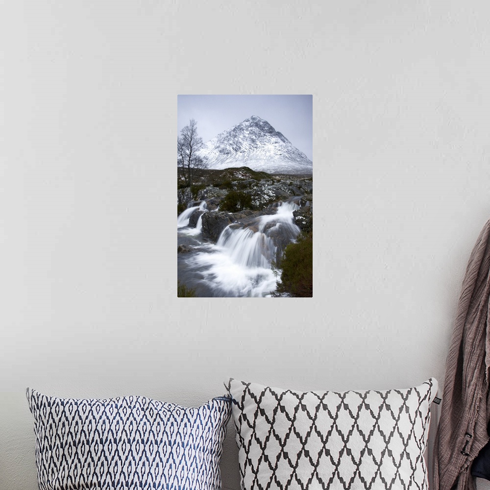 A bohemian room featuring Coupall Falls and Buachaille Etive Mor in winter, Glencoe, Scotland, UK