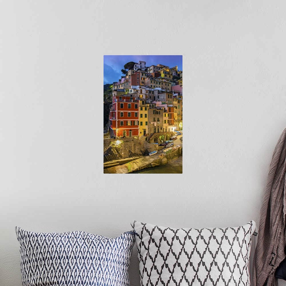 A bohemian room featuring Dusk view of the colorful sea village of Riomaggiore, Cinque Terre, Liguria, Italy