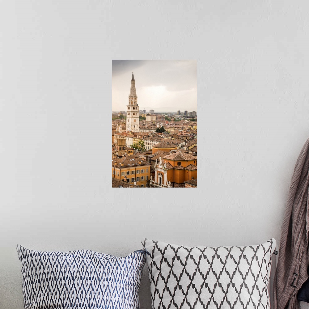 A bohemian room featuring Ghirlandina tower from top of Military Academy Palace in Piazza Roma. Modena, Emilia Romagna, Italy