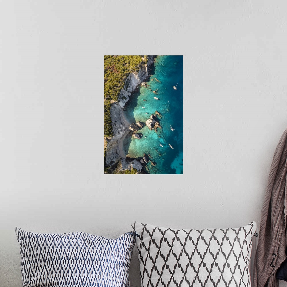 A bohemian room featuring I Pagliai beach and cove on Isola san Domino. Tremiti Islands, Foggia district, Puglia, Italy