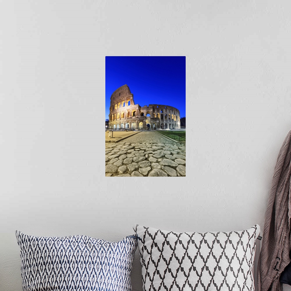 A bohemian room featuring Italy, Rome, Colosseum and Roman Forum by night