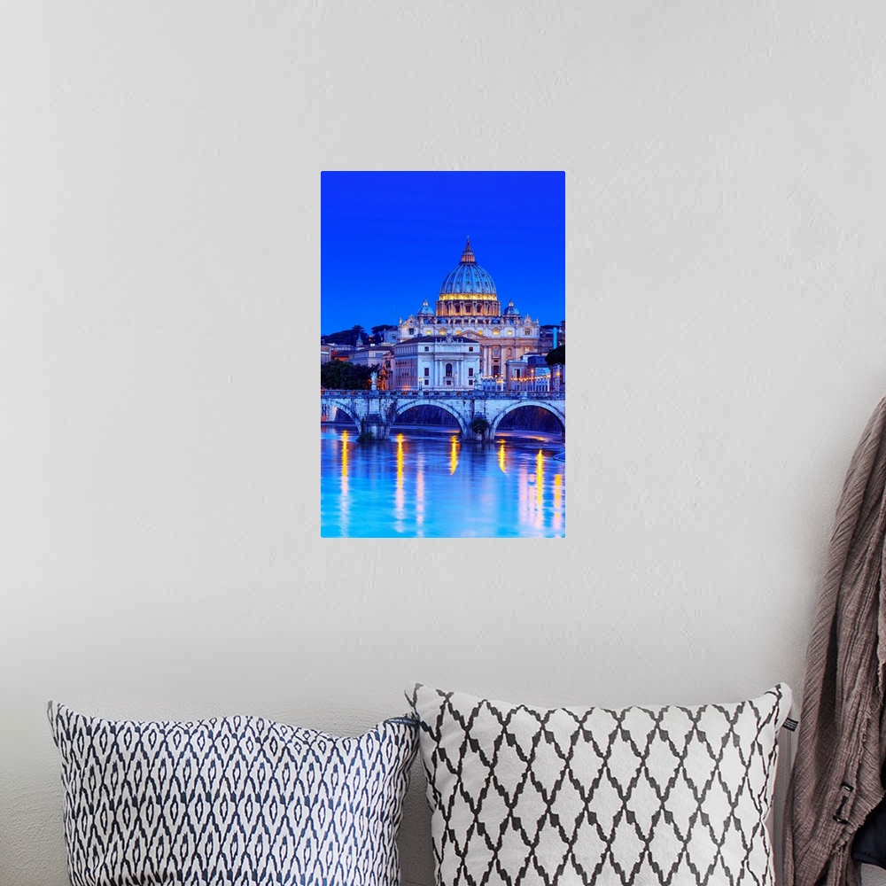 A bohemian room featuring Italy, Rome, St. Peter Basilica by night reflecting on Tevere river