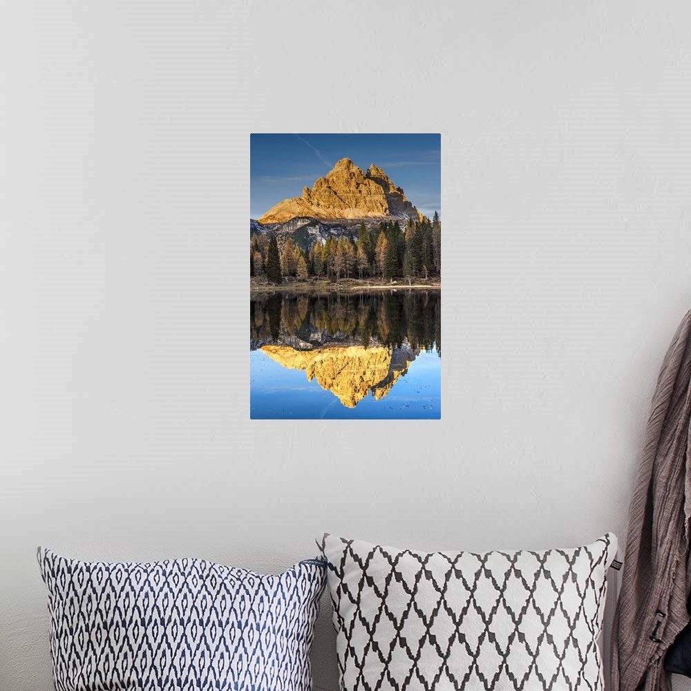 A bohemian room featuring Lake d'Antorno with Tre Cime di Lavaredo mountain group reflected in its waters, Misurina, Veneto...