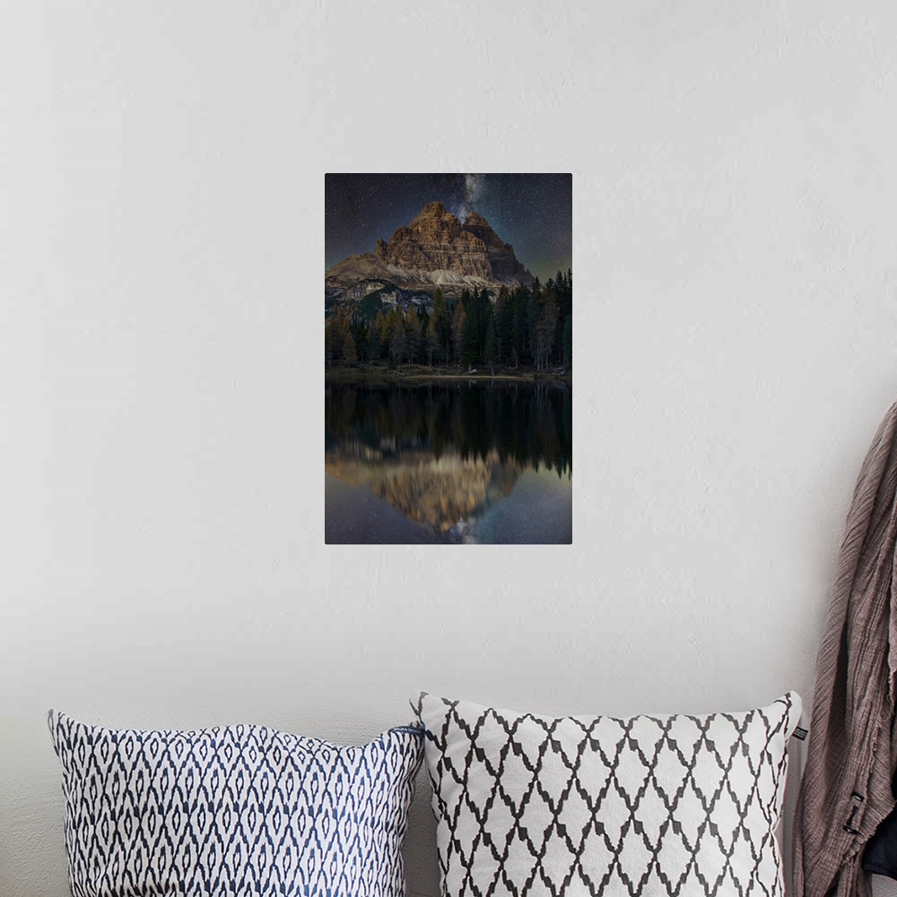 A bohemian room featuring Lake d'Antorno with Tre Cime di Lavaredo mountain group under a starry night, Misurina, Veneto, I...